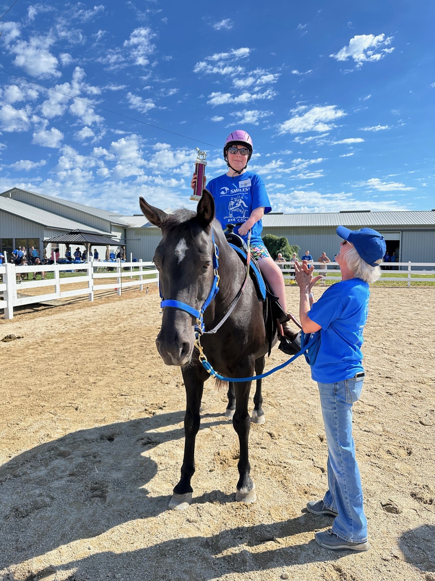 student riding horse