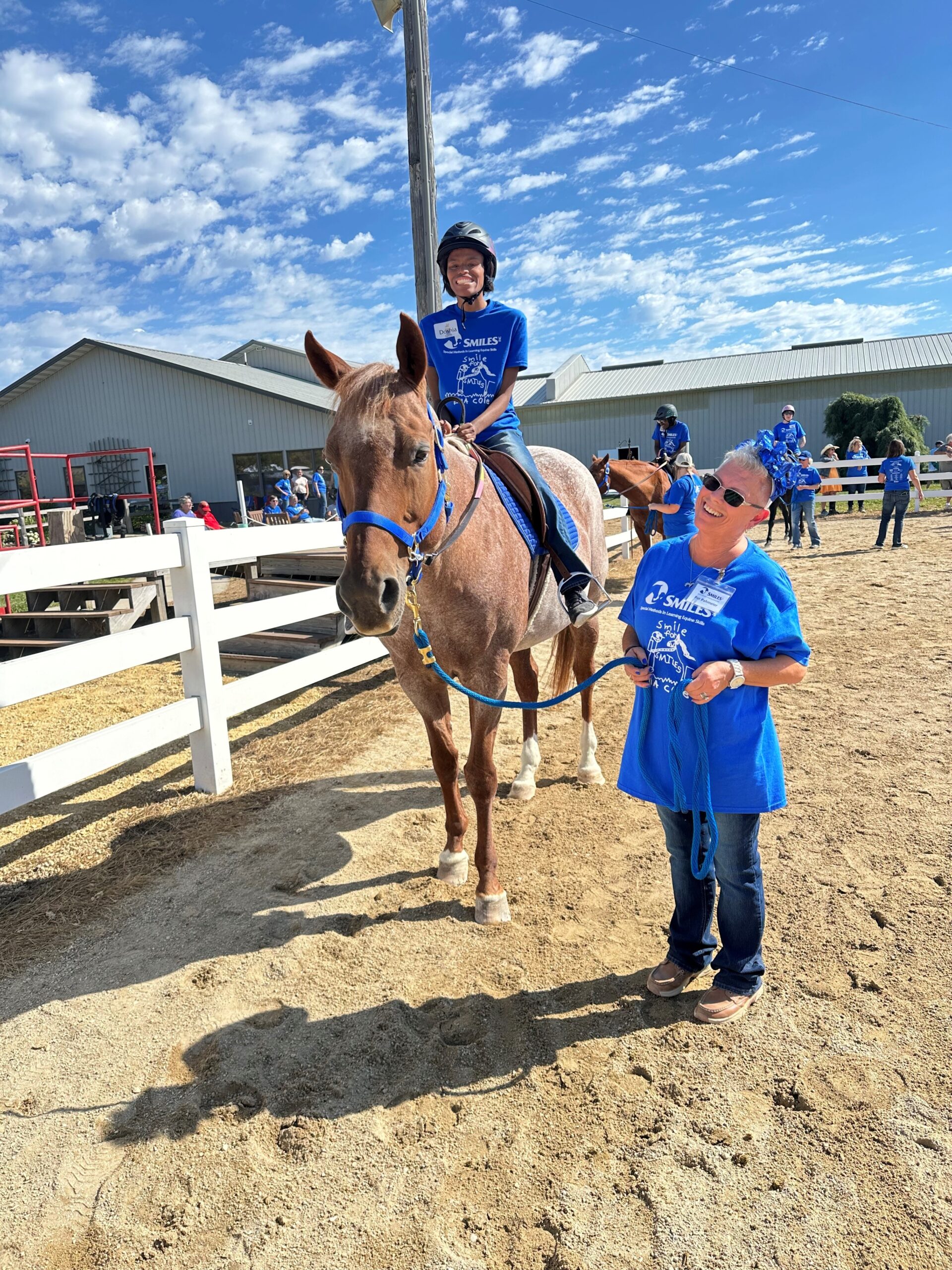 student riding horse