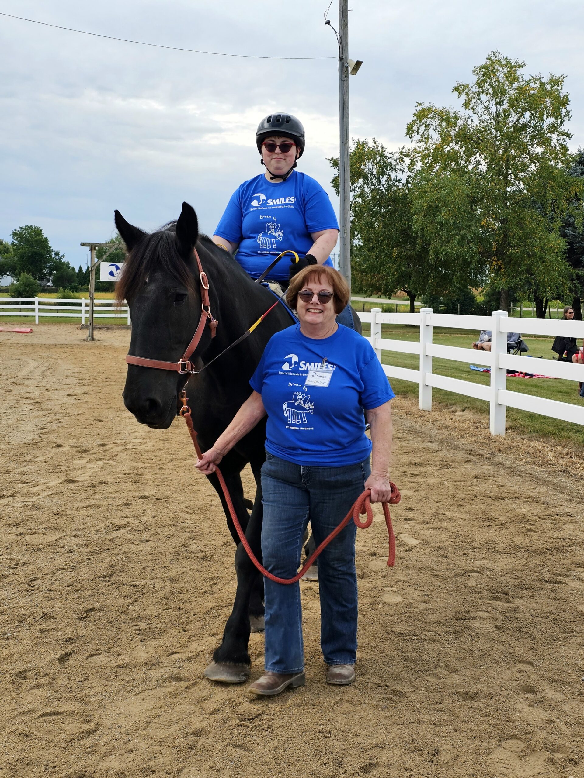 student riding horse