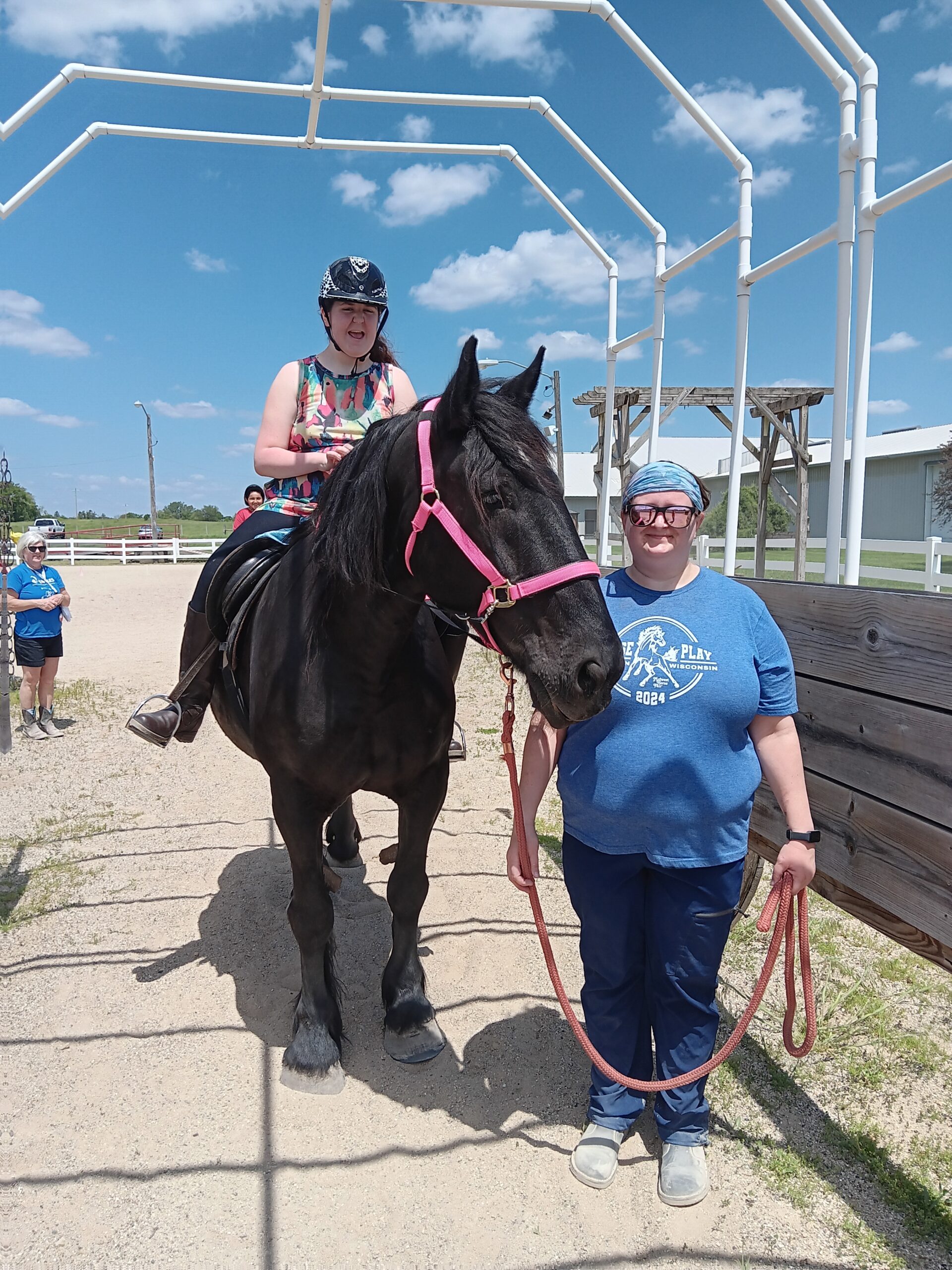 student riding horse