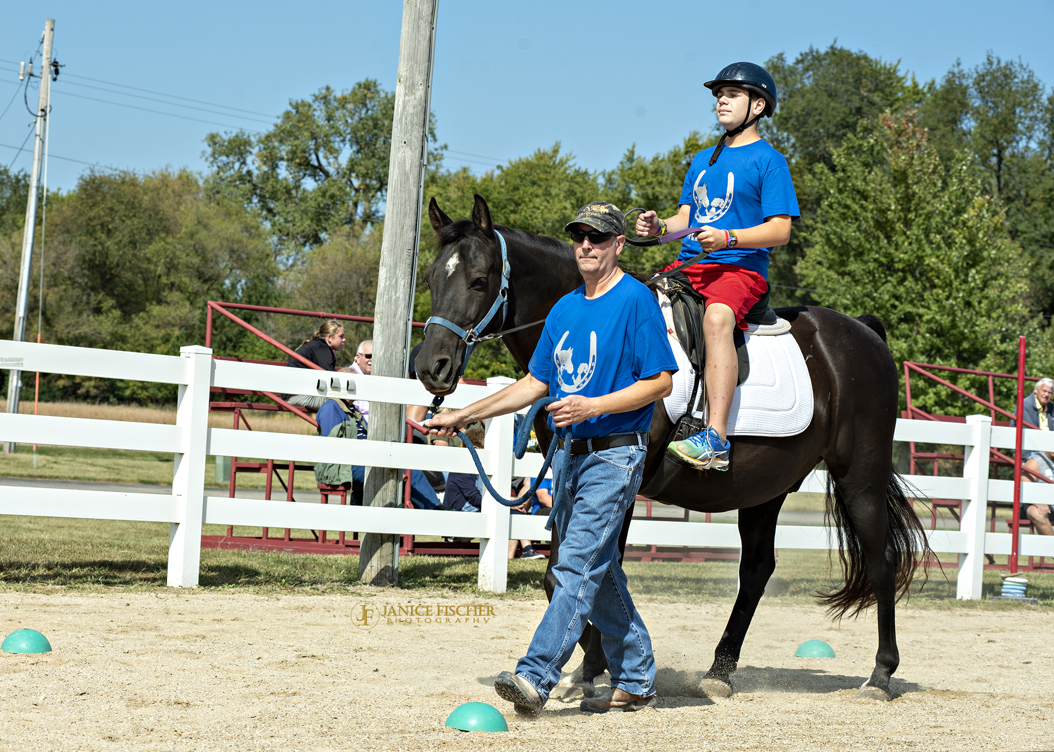 student riding horse
